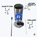 a cup with a straw and a spoon next to it