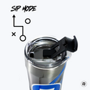 a close up of a metal cup with a black lid