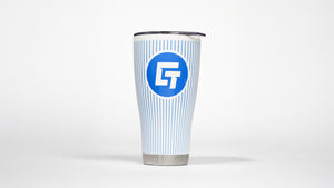 a blue and white cup with the letter f on it