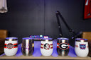Boise State 12oz stemless orange tumbler with black logo, made by gametimesidekicks, on a white background.